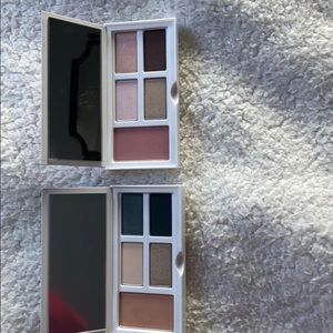 2 Clinique eye shadow and blush pallets .